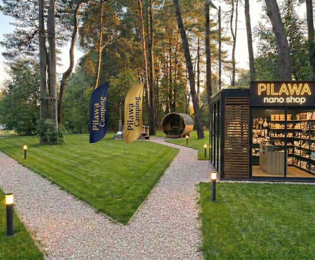 Wizualizacja: strefa SPA z sauną i balią nad wodą wieczorem
